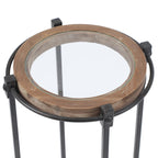 Set di 2 tavolini d'appoggio moderni rotondi, struttura in metallo nero, ripiano in vetro trasparente, cornice in legno di abete, salvaspazio