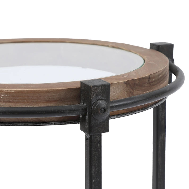Set di 2 tavolini d'appoggio moderni rotondi, struttura in metallo nero, ripiano in vetro trasparente, cornice in legno di abete, salvaspazio